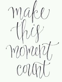 the words make this moment count written in cursive writing on white paper with black ink