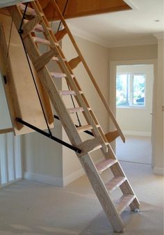 a ladder that is in the middle of a room