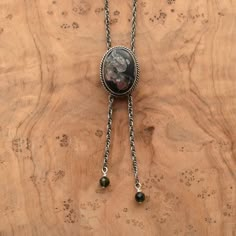 "This design is a success in so many ways. We love the traditional western bolo tie, but we wanted a more feminine version of it. We've used traditional southwestern silversmithing using .925 twist wire accents -- oxidized, sanded and polished. This necklace closes in the back with a clasp like any necklace and uses an ultra-comfortable .925 Sterling Silver rope chain -- the sterling silver chain \"tips\" (hematite) are an added bonus, and really add a lot. An LBJ original! The Mock Bolo. featur Western Bolo Tie, Bolo Necklace, Silver Rope Chain, Nails Jewelry, Tie Necklace, Stone Choker, Award Ceremony, Jasper Necklace, Fossil Coral