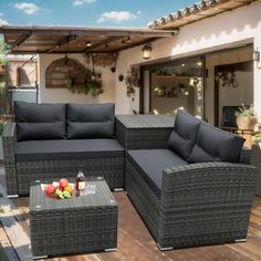 an outdoor furniture set on a wooden deck