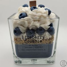 a blueberry crumble is in a glass container