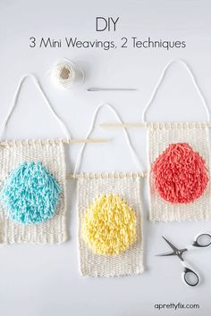 crocheted wall hangings with yarn and scissors next to them on a white surface