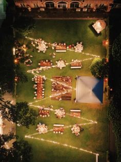 an overhead view of a lawn decorated with lights