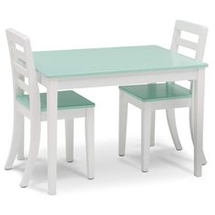 a white table and two chairs sitting next to each other