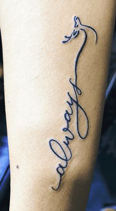 a woman's leg with a tattoo on it that reads, namaram