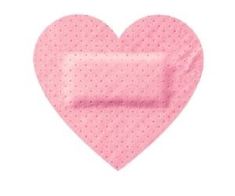 a pink heart with polka dots on it