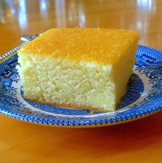 a piece of cake on a blue and white plate