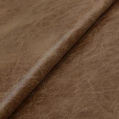 a brown leather textured fabric