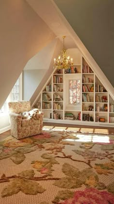 a room with a chair, bookshelf and rug in it