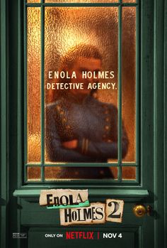 an image of a man behind a glass window with the words ebola homes written on it