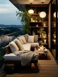 a couch sitting on top of a wooden floor next to a window covered in lights