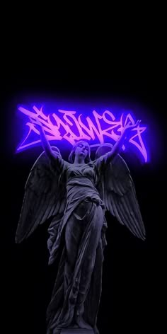 an angel statue with purple and black paint on it's face in front of a dark background