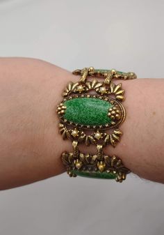 Baroque Inspired Chunky Metal and Green Enameled Petite Faux Pearl Bracelet- Vintage Wide Fantasy Bracelet- Vintage Costume Jewelry K#766 - Gold Tone Metal - Petite Faux Pearl Accents - Green enameling - Length: 7 inches - Width: 1 1/2 inch - Shown on 7 inch wrist (Very snug fit) - Hinged Clip Style Clasp  - Some Enameling showing wear (can be seen in images, please look prior to purchase) - Good and clean condition Vintage Gold Enamel Bracelets, Vintage Green Bracelets For Party, Retro Enamel Jewelry For Party, Retro Green Enamel Jewelry, Retro Enamel Party Jewelry, Vintage Enamel Jewelry For Parties, Vintage Enamel Bangle Jewelry, Adjustable Vintage Enamel Bracelets, Fantasy Bracelet