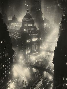 an aerial view of a city at night with lights and fog in the air,