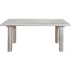 a white table sitting on top of a wooden floor