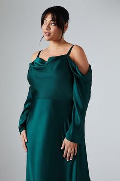 Imagined in a cowl neck silhouette with off-the-shoulder long sleeves, this plus size maxi dress flatters the wearer with its draped design. Made for romantic settings, this elegant style will elevate any bridal party. Made from satin: exuding a lustrous sheen, this satin fabric displays a textured appearance, adding extra character to every piece. A sturdy complexion helps hold the shape of the design for a curated silhouette whatever the style. Level of stretch: little. This dress fastens with a rear concealed zip. The print makes this dress perfect for a country wedding, ? Satin Bridesmaids Dress, Romantic Settings, Satin Bridesmaids, A Country Wedding, Plus Size Maxi Dress, Petite Jumpsuit, Maxi Bridesmaid Dresses, Petite Coat, Dresses Plus Size