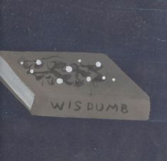 a piece of cardboard with writing on it