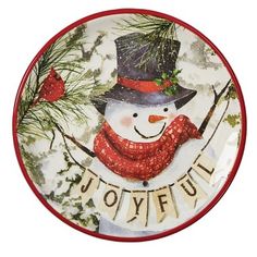 a plate with a snowman on it that says joyful