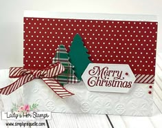 a christmas card with a tree on it