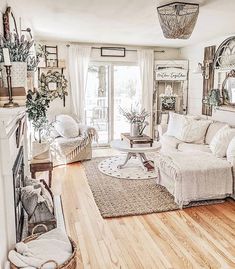 a living room filled with furniture and a fire place