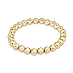 You're classic, reliable, and go-to bracelet. Made with 7mm, 14kt gold-filled beads Worry-free wear‚ which means sleep, shower and sweat in it Hand-beaded on high performance elastic for a slight stretch to easily roll on and off your wrist Extends (7.25") Stacks well with all bracelets Classic Gold, 14kt Gold, Hand Beading, Sale Items, Gold Filled, Beaded Bracelets, Beads, Gold