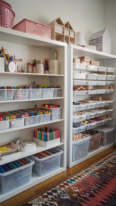 the shelves are filled with lots of crafting supplies and storage bins for children's arts and crafts