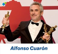 an older man in a tuxedo holding up two oscars for the film