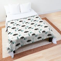 a bed with a bear pattern on it