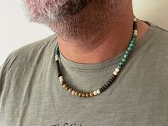 "Stone necklace, Men's Beaded Necklace with Turquoise and Jasper, Surfer necklace Water-resistant Beautiful necklace, made of 100% of gemstones like Turquoise, jasper, and Howlite. The size of the stones in the necklace is 6 mm. The necklace comes in three lengths of your choice: 40/50/60 cm- 15.5\"/20\"/24\" Perfect to keep or to give as a gift. Materials: *Jasper *Turquoise *Obsidian *Howlite All metals used are lead and nickel-free! Length: *15.5\"/40cm *20\"/50 cm *24\"/ 60cm Choose your siz Surf Necklace Mens, Men Stone Necklace, Surfing Jewelry, Wood Necklace Men, Boys Necklace, Mens Beaded Necklaces, Beautiful Beaded Necklaces, Surf Jewelry, Men's Necklaces