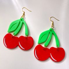 3d Printed Red and Green Cherry Earrings are made to order.  Earrings are about 2 inches tall and are lightweight! All earring backs can be swapped for gold or silver, fish hook or lever hook. 3d Printer Jewelry, Order Earrings, 3d Printed Earrings, Printed Earrings, Green Cherries, 3d Printed Jewelry, 3d Printing Projects, Cherry Earrings, Silver Fish