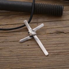 An artistic sterling silver cross necklace for men and women. What makes it most impressive, is thhe unique design with the know on the middle that is dramatically striking. Cross dimensions: 4 cm x 2.7cm (1.6x1.1 inches). Leather cord with stilver clasp and endings 48cm long (18.inches). If you require a longer or shorter strand, simply request for no additional charge. Handmade in Athens. Allow 5 - 8 working days for me to create your order. I ship worldwide from Greece with a tracking number; Minimalist Engraved Cross Jewelry, Modern Sterling Silver Cross Pendant Jewelry, Modern Sterling Silver Cross Pendant, Modern Necklaces With Cross Pendant As Gift, Minimalist Silver Cross Necklace, Modern Necklaces With Cross Pendant For Gift, Modern Cross Pendant Necklaces As Gift, Modern Silver Necklace With Cross Pendant, Handmade Stainless Steel Cross Pendant Jewelry