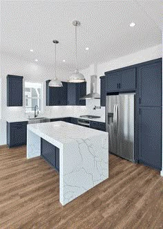 a large kitchen with blue cabinets and marble counter tops, an island in the middle