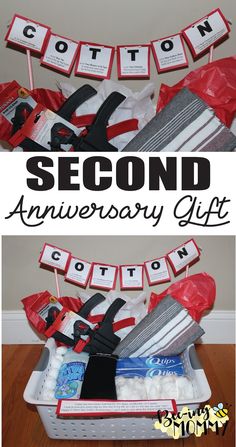 the second anniversary gift is in a basket with red and white ribbon on it,