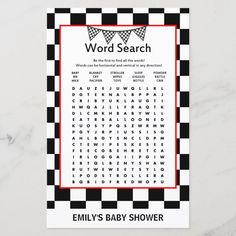 the word search game for baby shower is displayed on a marble surface with black and white checkerboard