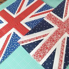 the union jack flag quilts are being sewn together