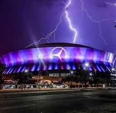 lightning strikes over the mercedes stadium in atlanta