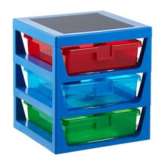 three bins stacked on top of each other in a blue container with red and green lids