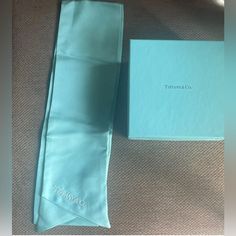 Tiffany & Co Light Blue Silk Scarf W/ Box. Measures 59” X 4”. Nice Condition, Could Use Minor Cleaning But Overall Looks Nice. Thanks For Looking! Overall Looks, Blue Silk Scarf, Box Color, Blue Silk, Tiffany & Co., Silk Scarf, Scarf Wrap, Scarf Accessory, How To Look Better