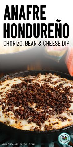 a close up of a pizza in a pan on a stove with the words anafre hondurenoo, chorizo, bean and cheese dip