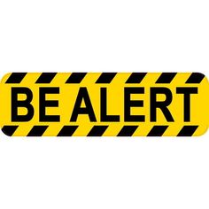 a yellow and black sign that says be alert