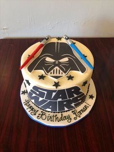 a star wars themed birthday cake with a darth vader theme