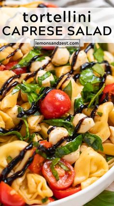 tortellini caprese salad in a white bowl