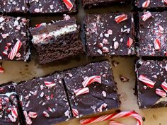 chocolate brownies with candy canes and peppermints on a baking sheet, ready to be eaten