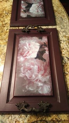 two framed pictures with pink flowers in them