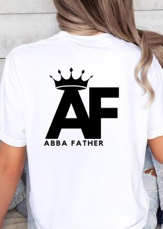 **DESCRIPTION** Embrace your identity as a child of God with this "AF - Abba Father" t-shirt, featuring a bold design with a crown atop the letter "A." The abbreviation "AF" stands for Abba Father, highlighting the close, intimate relationship we have with God as our Heavenly Father. The crown symbolizes His kingship and sovereignty, making this shirt a powerful expression of your faith and devotion to the One who reigns over all. **SHIRT DETAILS** Comfort Colors introduces the "Comfort Colors 1 Faith Shirts, Abba Father, Bible Verse Shirt, Father Shirts, Jesus Shirt, Faith Shirt, Jesus Shirts, Shirts For Women, Heavenly Father