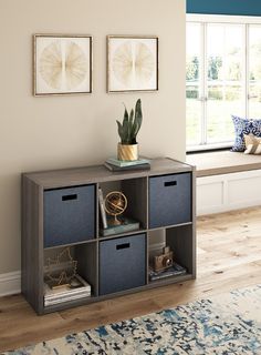 a living room with blue and white decor