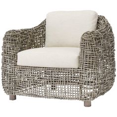 a wicker chair with a white cushion