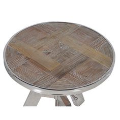 a round wooden table with metal legs