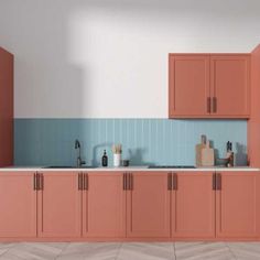 an image of a kitchen setting with pink cabinets and blue backsplashes on the walls