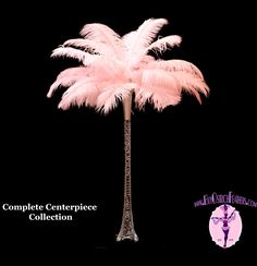 a tall pink palm tree sitting on top of a black background with the words, complete centerpiece collection